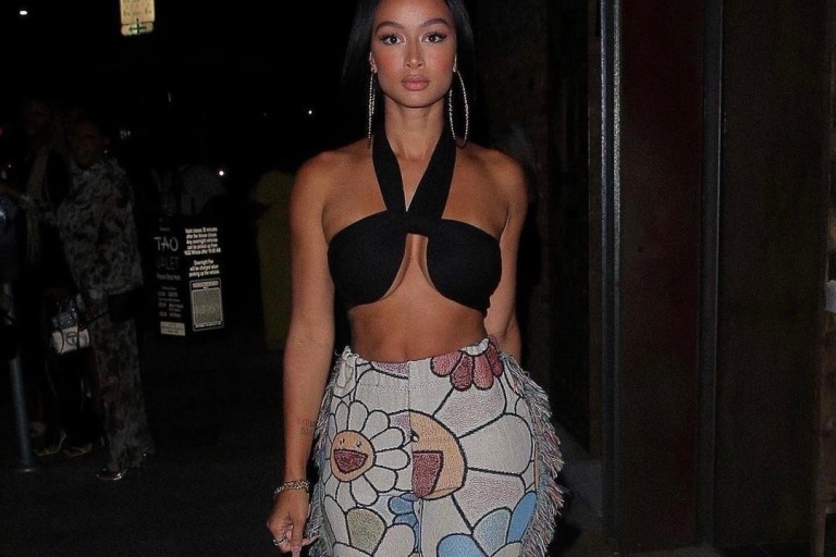 Wardrobe Inquiry: Draya Michele Heads Out for the Night in LA Wearing JLUXLABEL Black Bandeau Top and Murakami Tapestry Pants by Creations by Camyyo