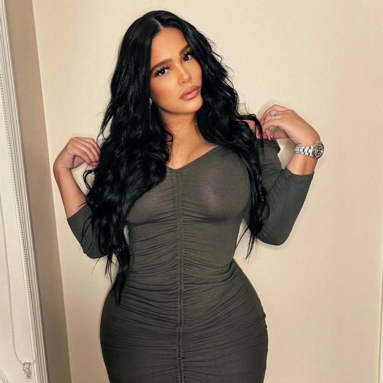 Emily B Shows Off Her Curves in Fashion Nova Black Ruched Off-the-Shoulder Dress