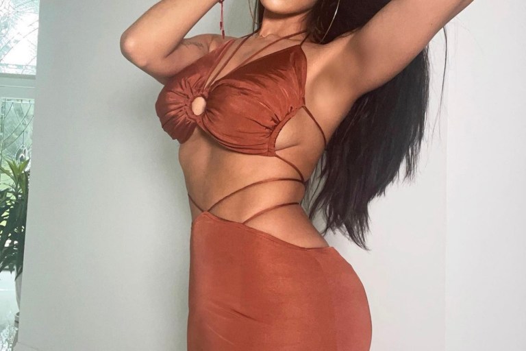 Erica Mena Shows Out in Fashion Nova O-Ring Crop Top and Maxi Skirt Set
