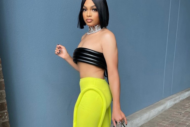 Wardrobe Inquiry: Alonzo Arnold Stuns in TLZ L’Femme Look Featuring Black Stacked Tube Bandeau Top and Lime Green Leggings