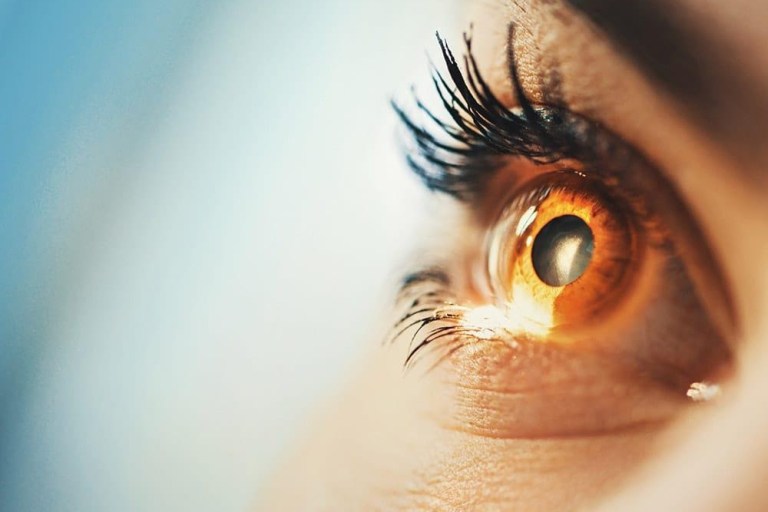 Who should wear a photochromic lens?