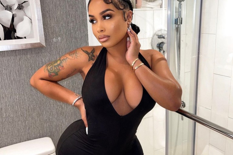 DreamDoll Shows Off Her Curves in Fashion Nova Black Halter Romper