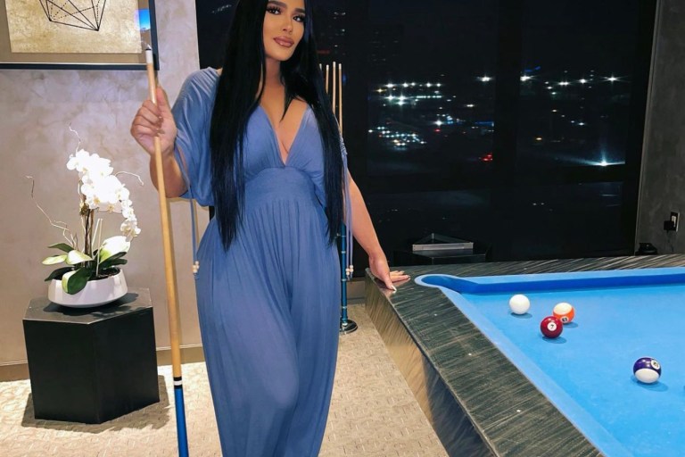 Emily B Enjoys a Game of Pool Wearing Flowy Blue Jumpsuit by Fashion Nova