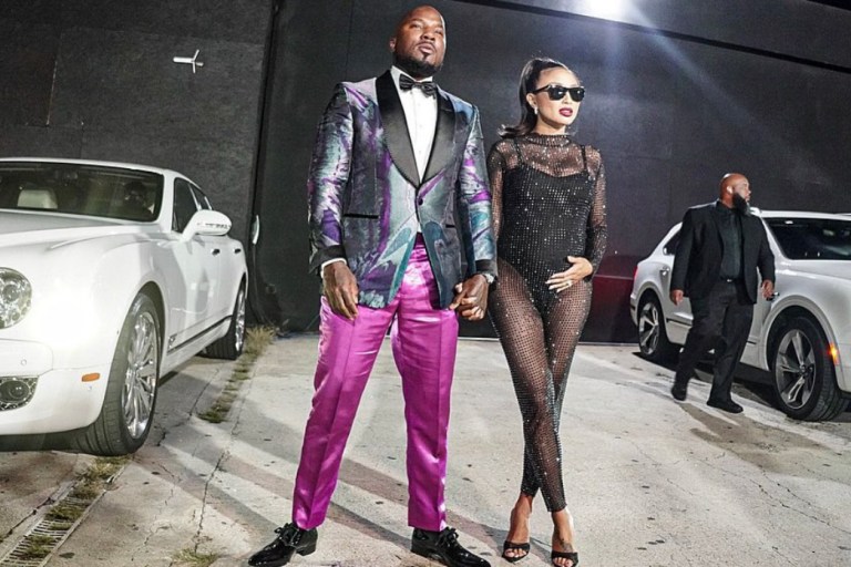 Jeezy Celebrates His Birthday With Jeannie Mai Along With Friends and Family at His Party Wearing Tom Ford Shirt and Jacket Paired With Téo Flor Pink Metallic Pants