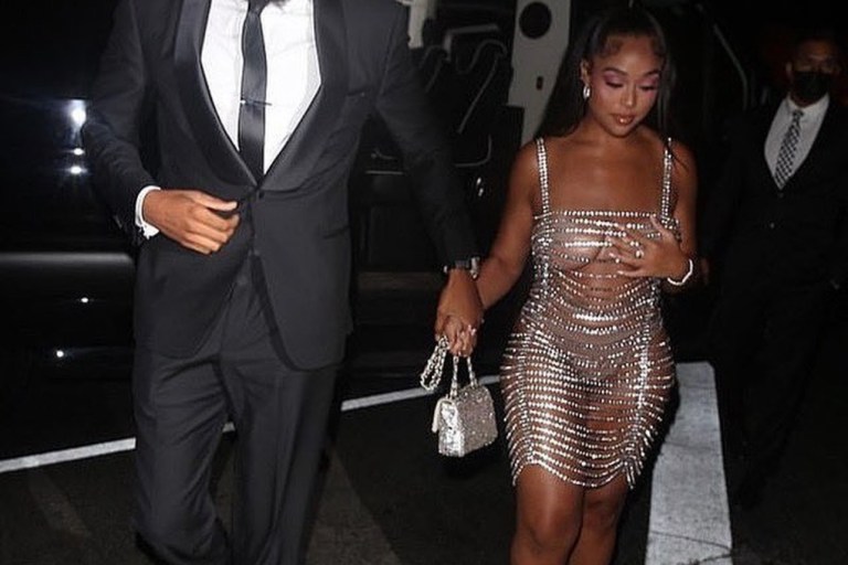 Wardrobe Inquiry: Jordyn Woods Dazzles in Area Draped Crystal Mini Dress as She Celebrates Her Birthday with Boyfriend Karl-Anthony Towns