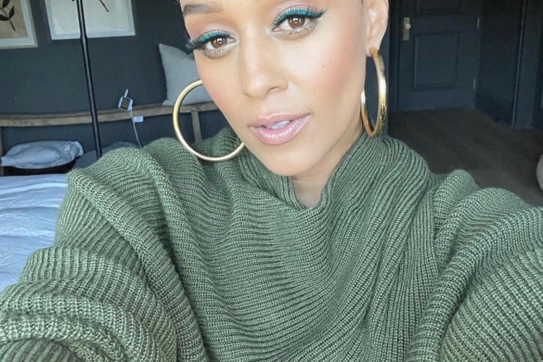 Wardrobe Inquiry: Tia Mowry Is Fall-Ready in Olive Green Look Including Alice and Olivia Crossover Sweater