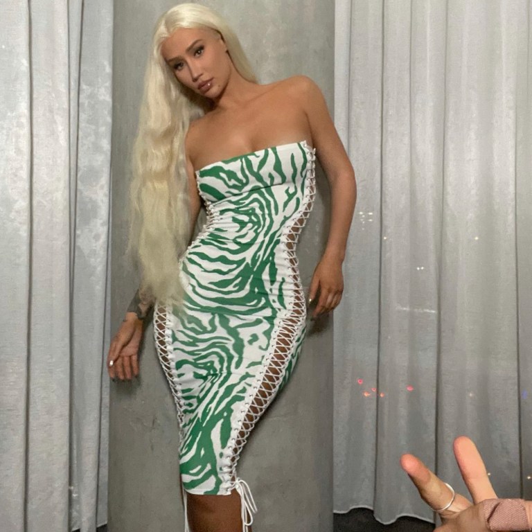 Iggy Azalea Poses in Fashion Nova Green and White Animal Print Lace-Up Tube Dress