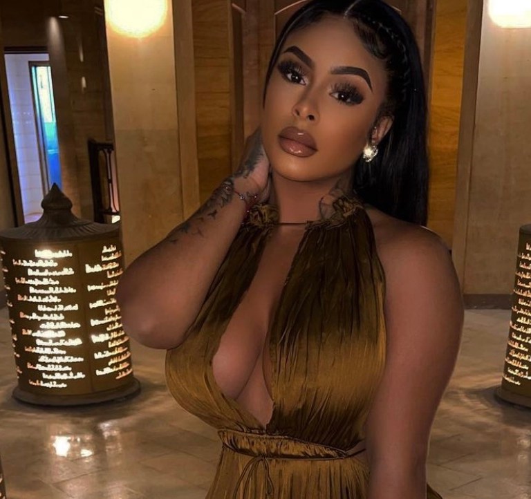 Wardrobe Inquiry: Alexis Skyy Spotted Enjoying Her Egypt Trip in Zara Olive Green Satin Wrinkle-Effect Cutout Dress and Louis Vuitton Monogram Vanity Bag