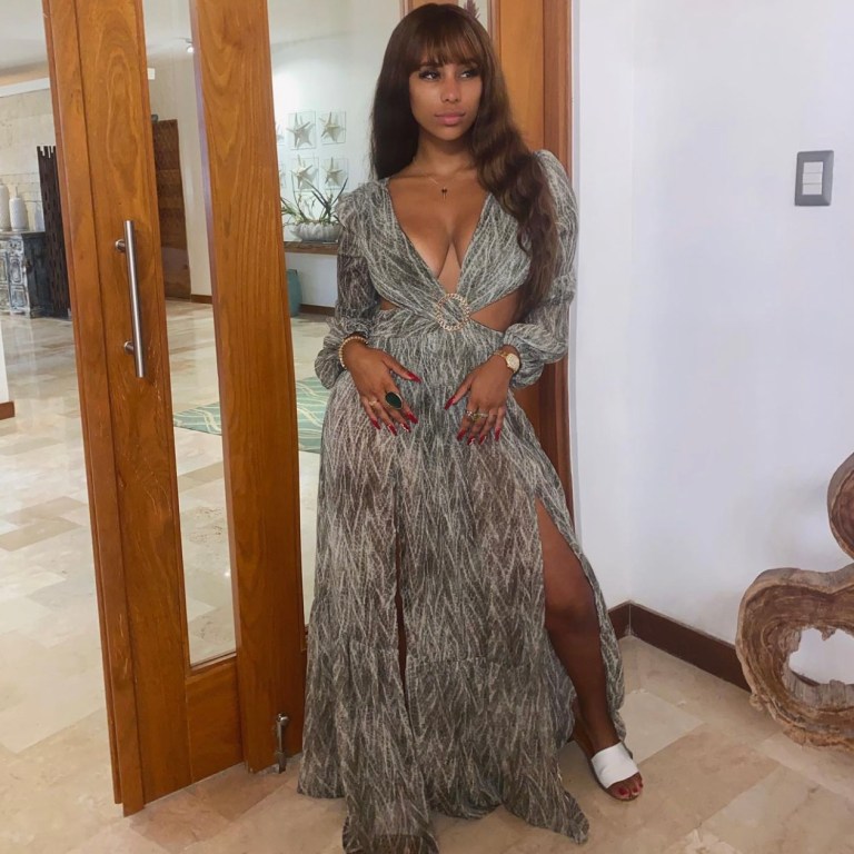 Cyn Santana Vacays in Fashion Nova Olive Green Cutout Long Sleeve Maxi Dress