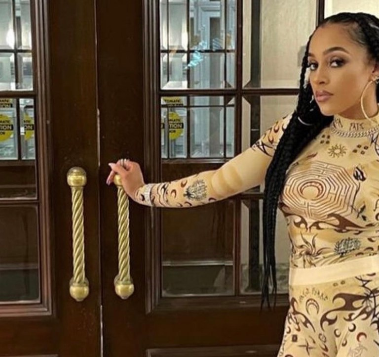 Joie Chavis Wears Marine Serre Beige Tattoo Print Top and Leggings for Night Out