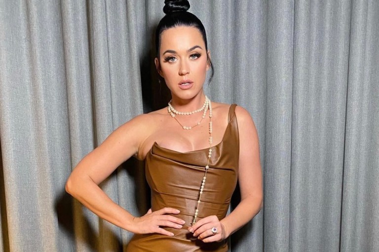 Katy Perry Wears Custom Vivienne Westwood Brown Leather One-Shoulder Dress to the 2021 CMA Awards