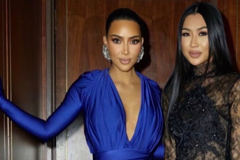 Kim Kardashian Attends Simon Huck and Phil Riportella’s Pre-Wedding Event Wearing Balenciaga Fall/Winter 2020 Blue Satin Look