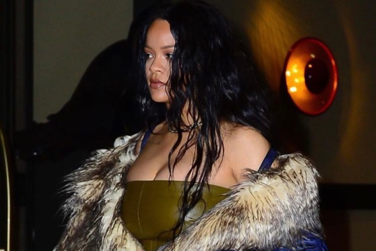 Rihanna Wears Prada Fur Nylon Raincoat, Rosetta Getty Green Strapless Leather Top, Ripped Jeans, and Tom Ford Snakeskin Padlock Sandals While Out in NYC
