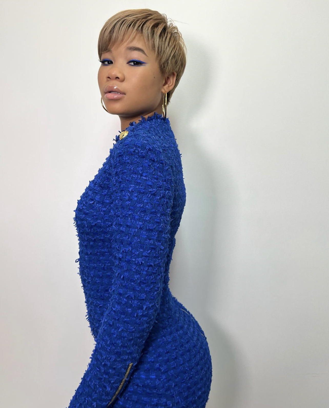 Storm Reid Wears a Balmain Blue Tweed Long Sleeve Dress While Doing Press  for 'Euphoria' - Fashion Bomb Daily