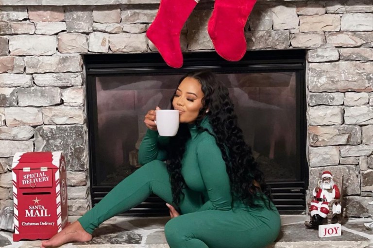 Angela Simmons Celebrates the Holidays Wearing Fashion Nova Green Two Piece Legging Set