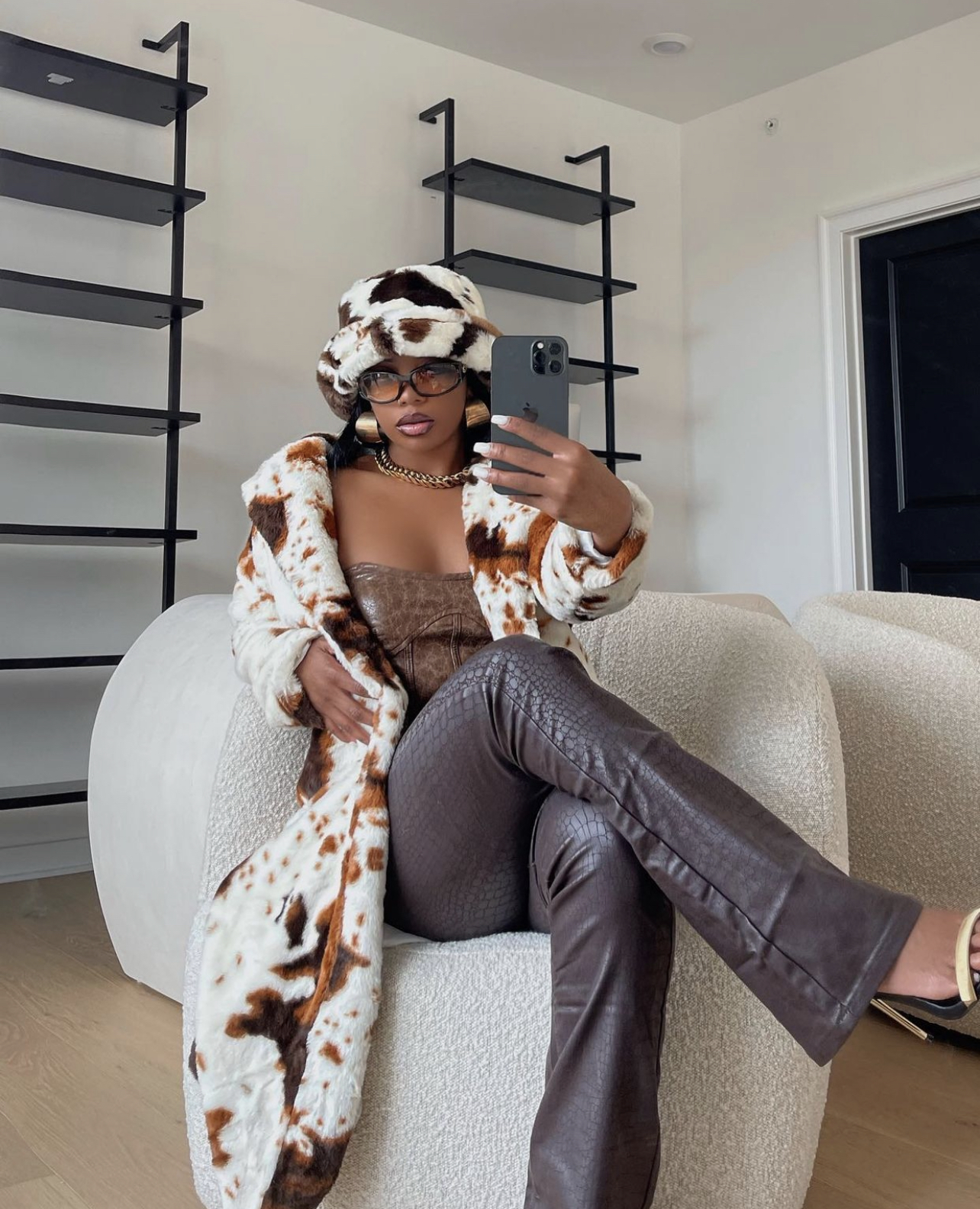 De arra Taylor Stuns in Fashion Nova Cow Print Faux Fur Coat Fashion Bomb Daily