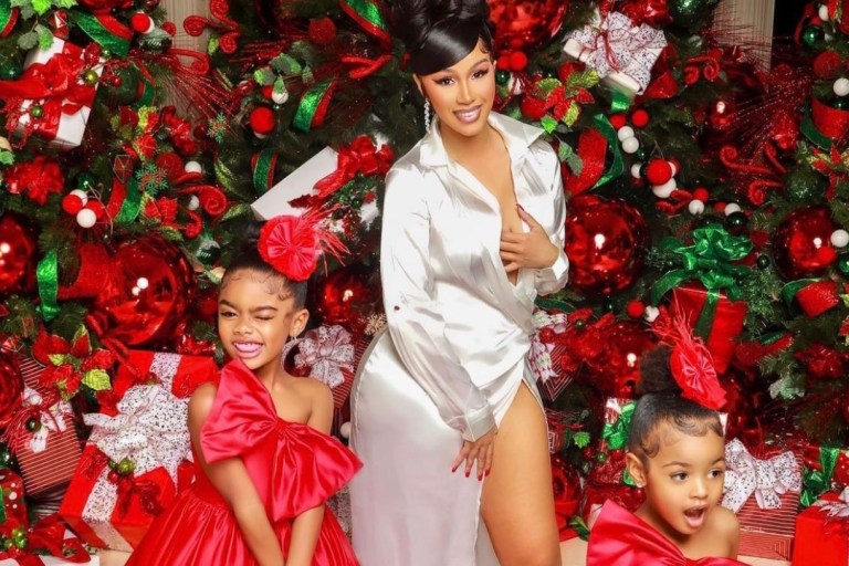 Fashion Bomb Families Celebrate the Holidays in Style: Mariah Carey and Family in Dolce and Gabbana Red Plaid Pajamas, Cardi B in JLUXLABEL White Plunge Satin Maxi Dress with Kulture and Kalea in Red Satin Bow Detail Dresses, Monique and Melvin Rodriguez’s Family in Skims Brown Fuzzy Sets + More