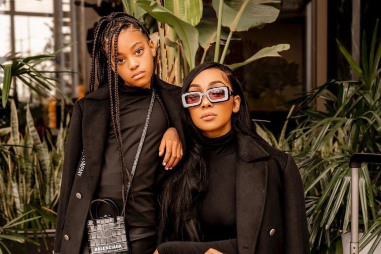 Monica and Daughter Laiyah Get Fly Together in Matching Black Milano Di Rouge Black Trench Coats
