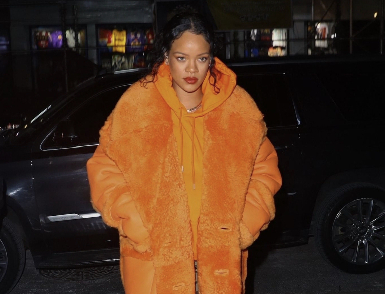 Rihanna Steps Out in NYC Wearing Orange Faux Fur Bottega Veneta Coat, Celine Top and Camouflage Trousers, and Gucci x Balenciaga Heels