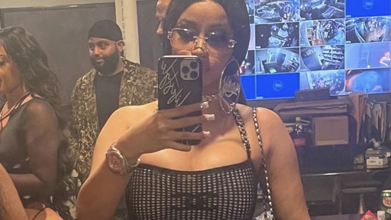 Cardi B Celebrates New Year's Eve Wearing Chanel Resort 2022 Black Fishnet  Logo Mini Dress - Fashion Bomb Daily