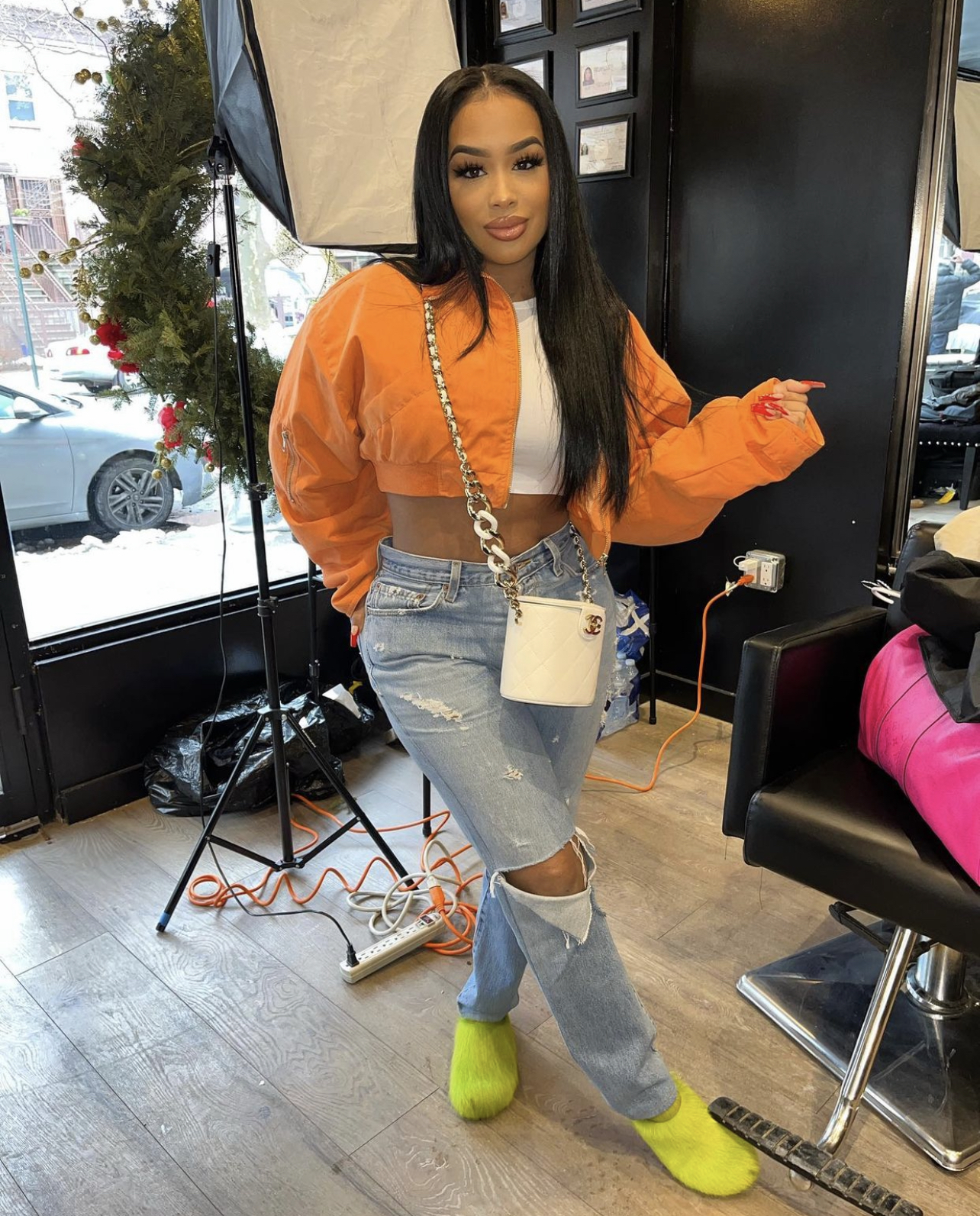 DreamDoll Spotted on Set Wearing Fashion Nova Orange Cropped Puffer