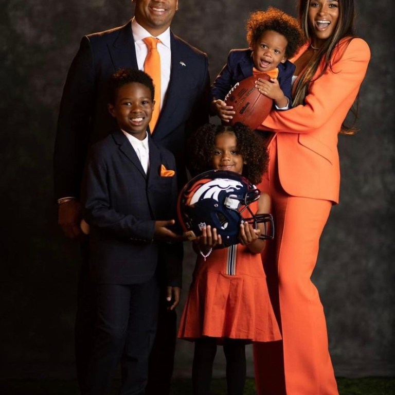 Ciara Wears a David Koma Orange Resort 2022 Suit During Family Photoshoot with Husband Russell Wilson and Their Children