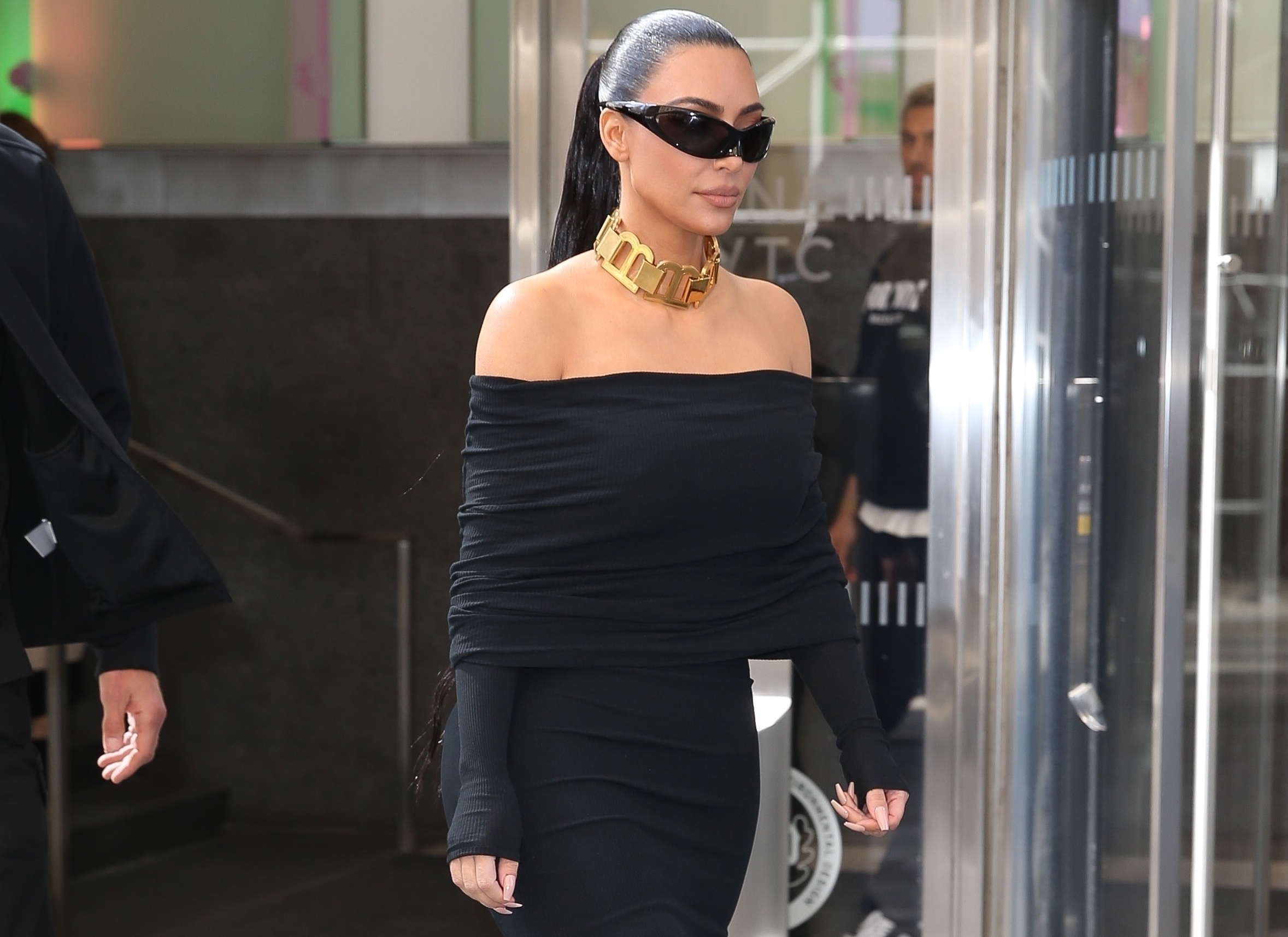 Kim Kardashian Can Barely Walk in Balenciaga Fall 2022 Off the Shoulder Black Long Sleeve Maxi Dress Fashion Bomb Daily