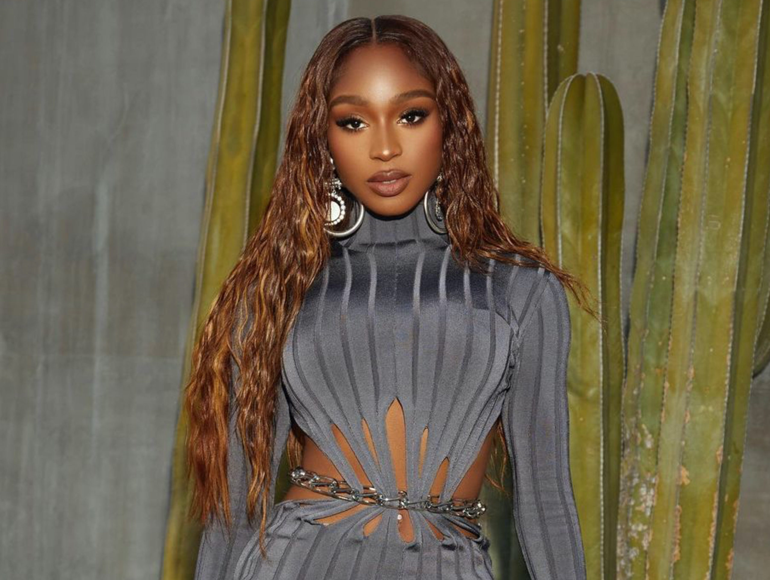 Normani Stuns in Dion Lee Gray Ribbed Cut Out Chain Detail Dress and  Jessica Rich Silver Drip Sandals - Fashion Bomb Daily