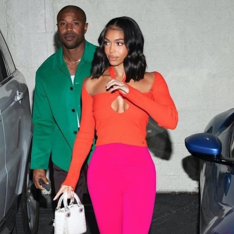 Lori Harvey Steps out with Boyfriend Michael B. Jordan wearing a Orange Attico Mali top and Pink Attico Jamie Leggings