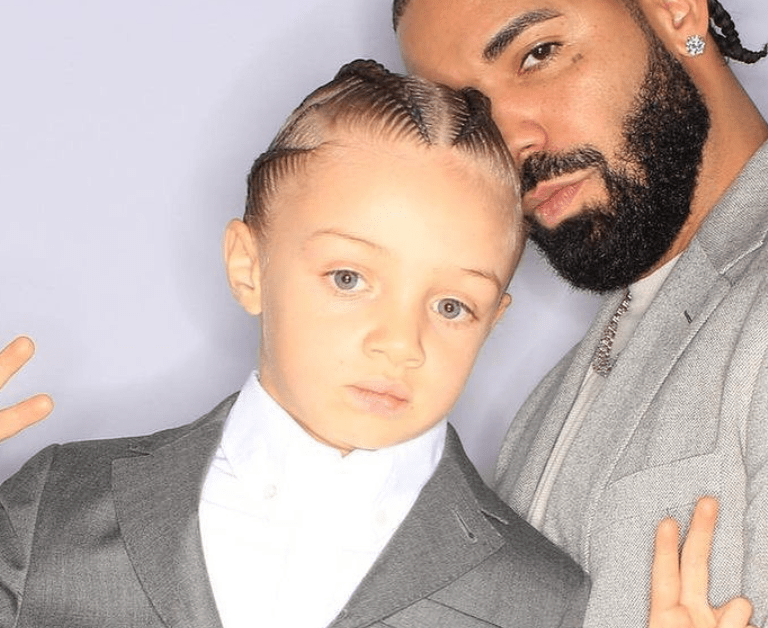 Drake and His Son Adonis Celebrate Mom Sandi Graham’s Birthday in Coordinating Gray Suits