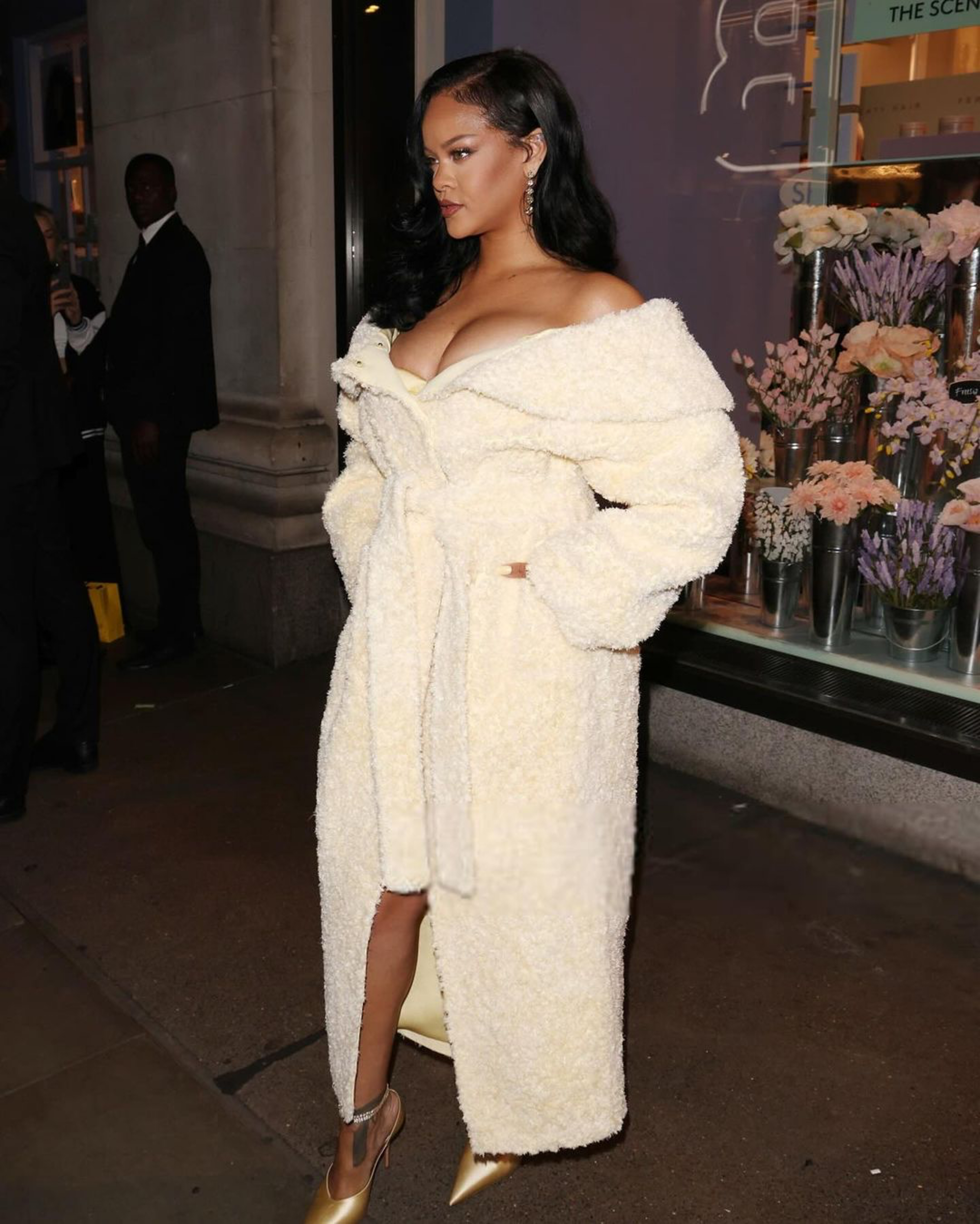 Rihanna Launches Fenty Hair in London in a Jacquemus Cream Coat John Galliano SS 06 Ruffle Dress and Gold Custom Amina Muaddi Heels