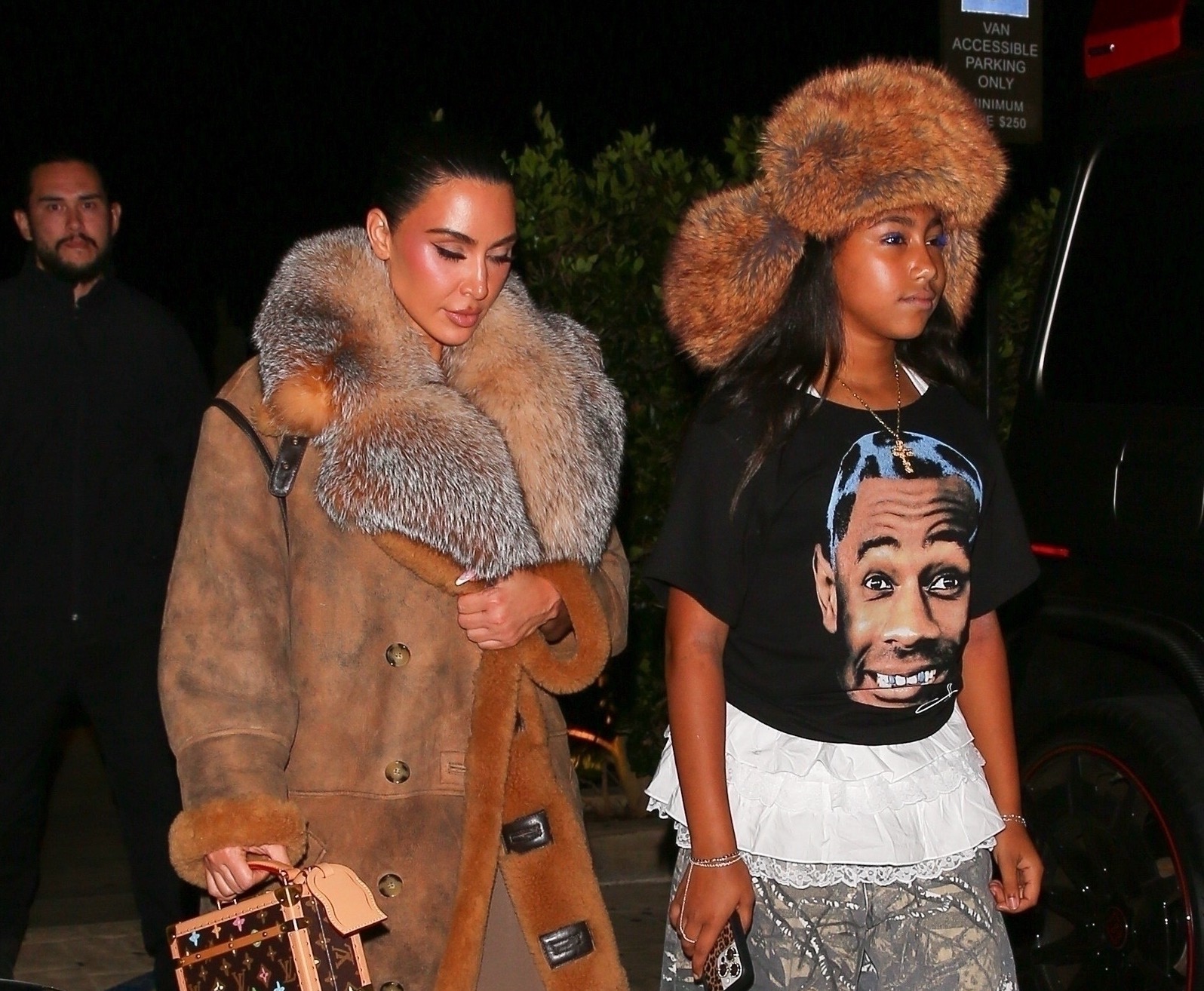 Kim Kardashian and North West Grab Dinner at Nobu Malibu with Kim Rocking a ,100 Louis Vuitton Trunk Bag