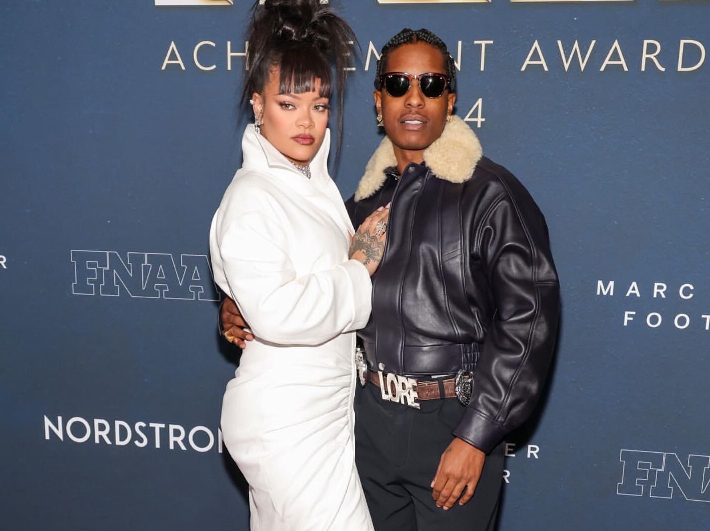 Rihanna and ASAP Rocky Attend the Footwear News Awards in a Custom White Alaia Gown + a Black Leather Phoebe Philo Coat