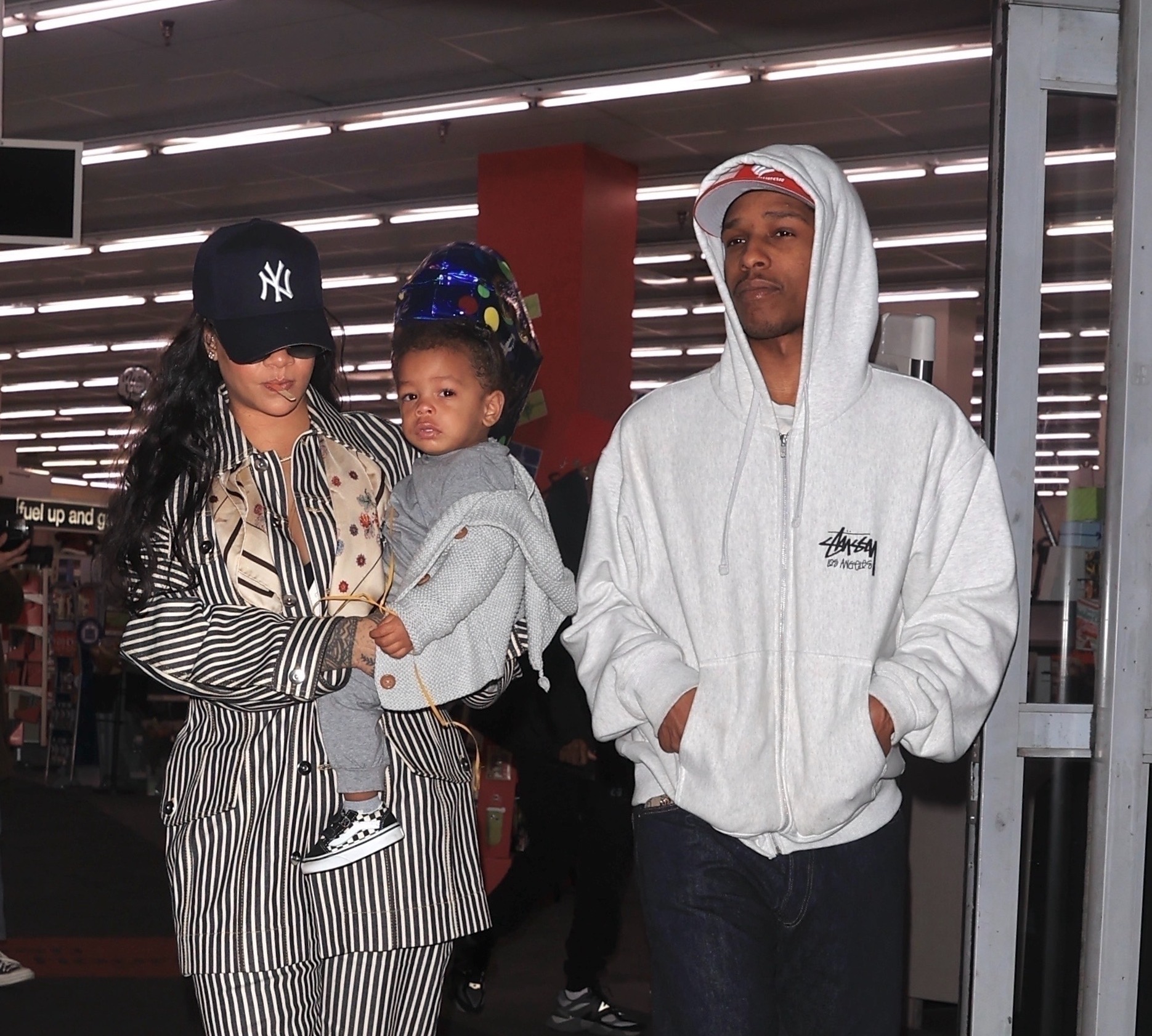 Rihanna and ASAP Rocky Shop at CVS with Son Riot Rose in Striped Bottega Veneta and Stussy #AsapRocky