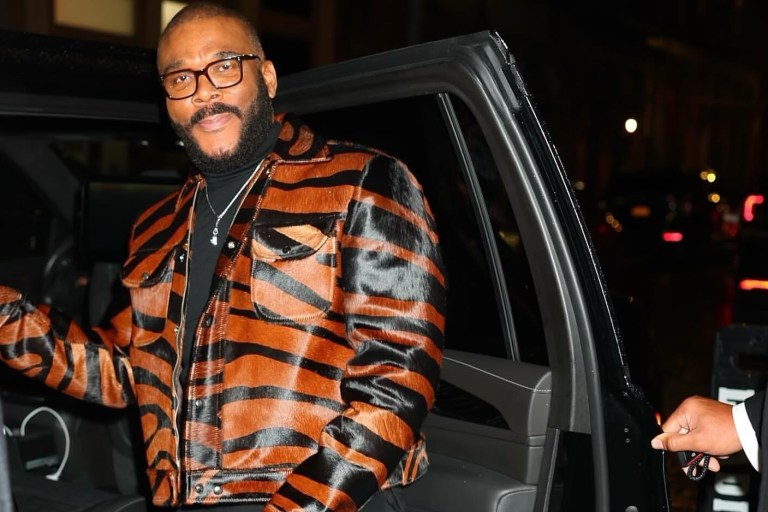 Tyler Perry Promotes Six Triple Eight in a House of Gray Custom Pony Hair Jacket