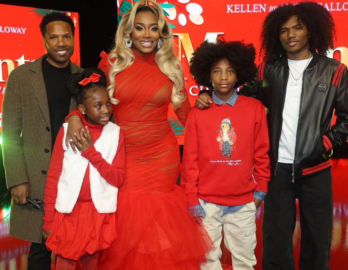 Yandy Smith Sings at the Mr Santa the Movie Premiere in Atlanta in a Red Oyemwen Gown Available at Fashion Bomb Daily Shop!