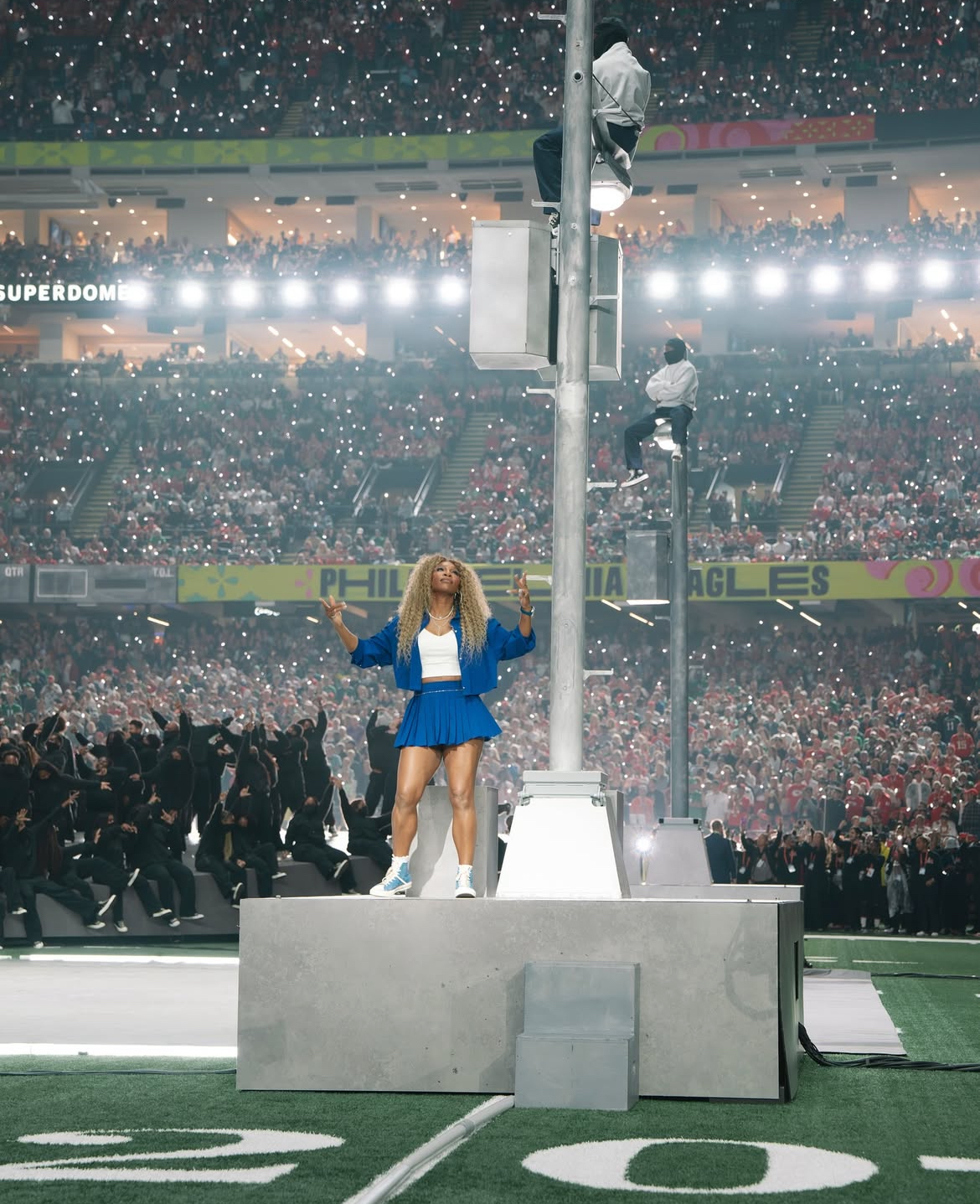 Serena W3illiams Crip Walks On Stage At The Super Bowl LIX In A Custom Blue Nike Crop Jacket And Mini Pleated Skirt