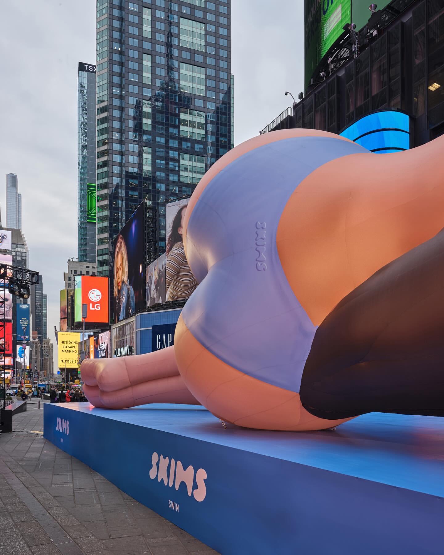 Kim Kardashian Promotes Skims Swim With A Blue Bikini Clad Blow Up Doll In Times Square IMG 5223