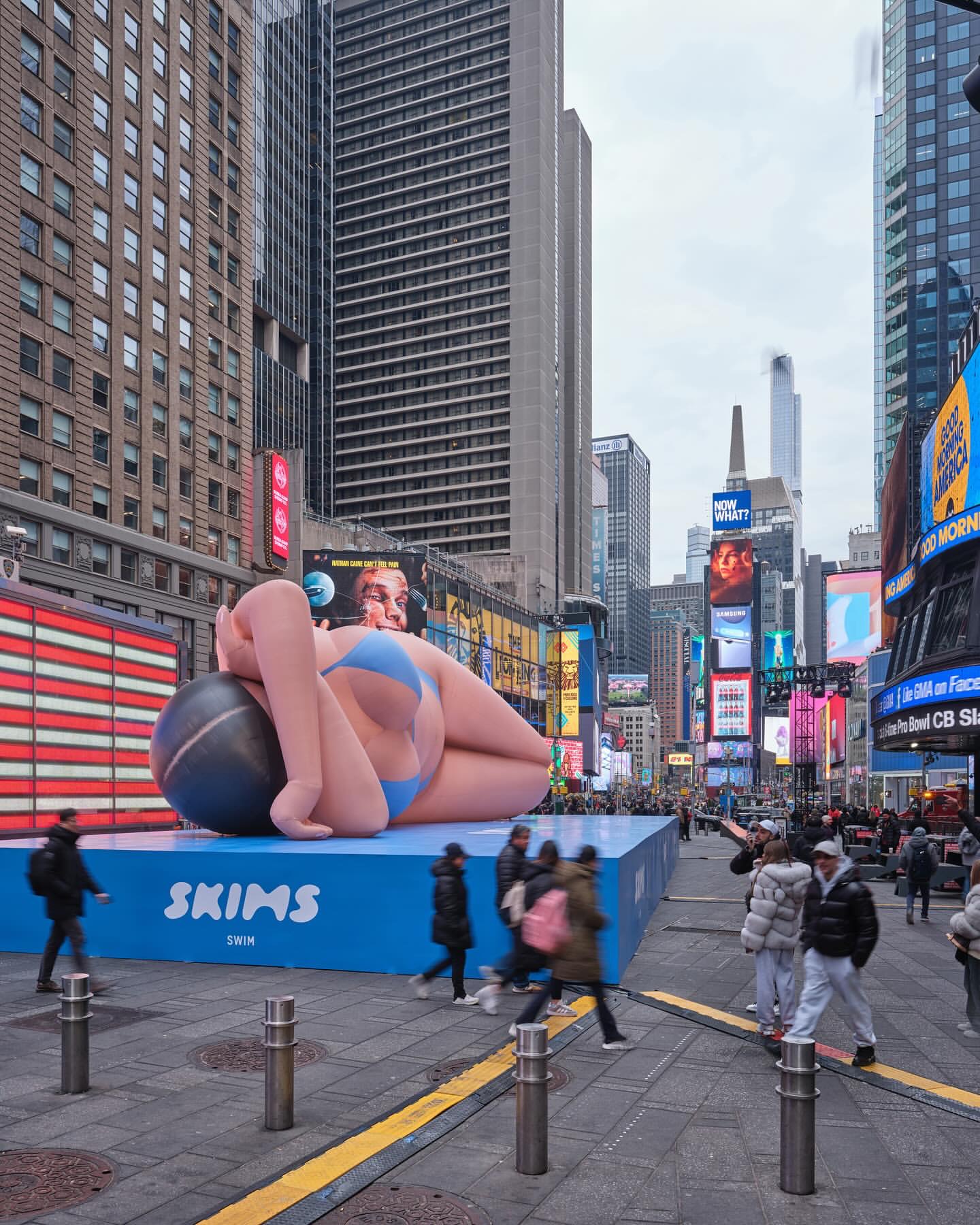 Kim Kardashian Promotes Skims Swim With A Blue Bikini Clad Blow Up Doll In Times Square IMG 5225