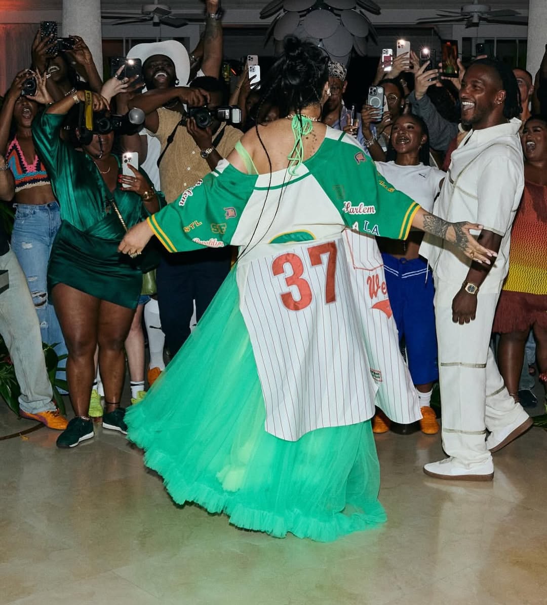 Rihanna Celebrated The Latest Fenty X Puma Collection In A White Pinstripe Jersey And A Seafoam Green Skirt 2