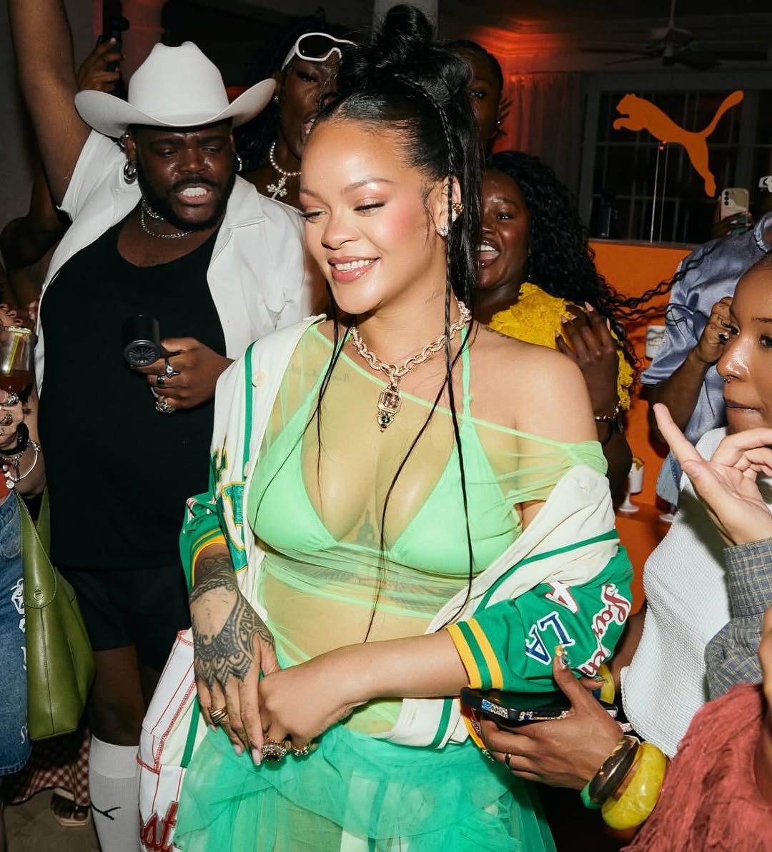 Rihanna Celebrated The Latest Fenty X Puma Collection In A White Pinstripe Jersey And A Seafoam Green Skirt 3