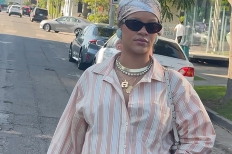 Rihanna Spotted in LA Wearing a Striped Savage x Fenty Pajama Set and Blush Satin Maison Margiela Tabi Ballet Flats