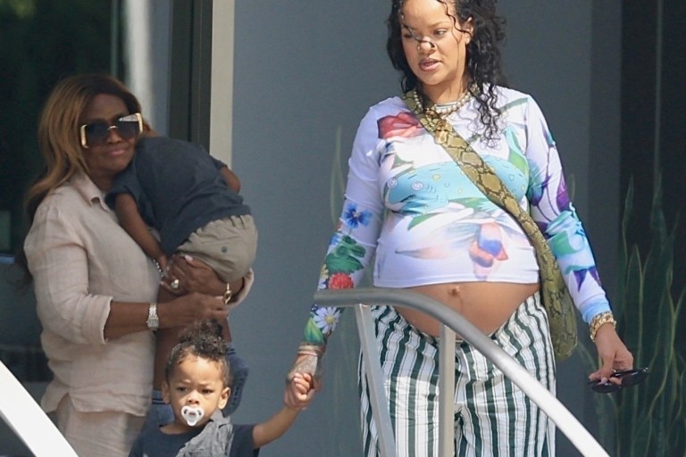 Rihanna Steps Out in Floral Chopova Lowena Blue Chameleon Top and Green-Striped Savage x Fenty Pants with Her Mom and Sons RZA and Riot in Beverly Hills
