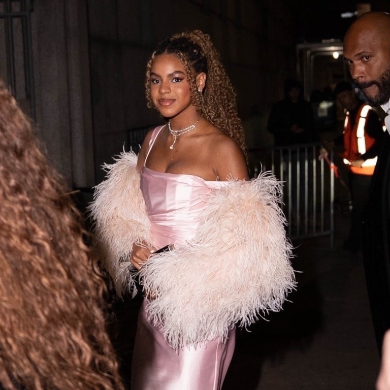 Blue Ivy Carter, 13, Shines in a Pink Babyboo Satin Gown and Feather Shawl at the Angel Ball