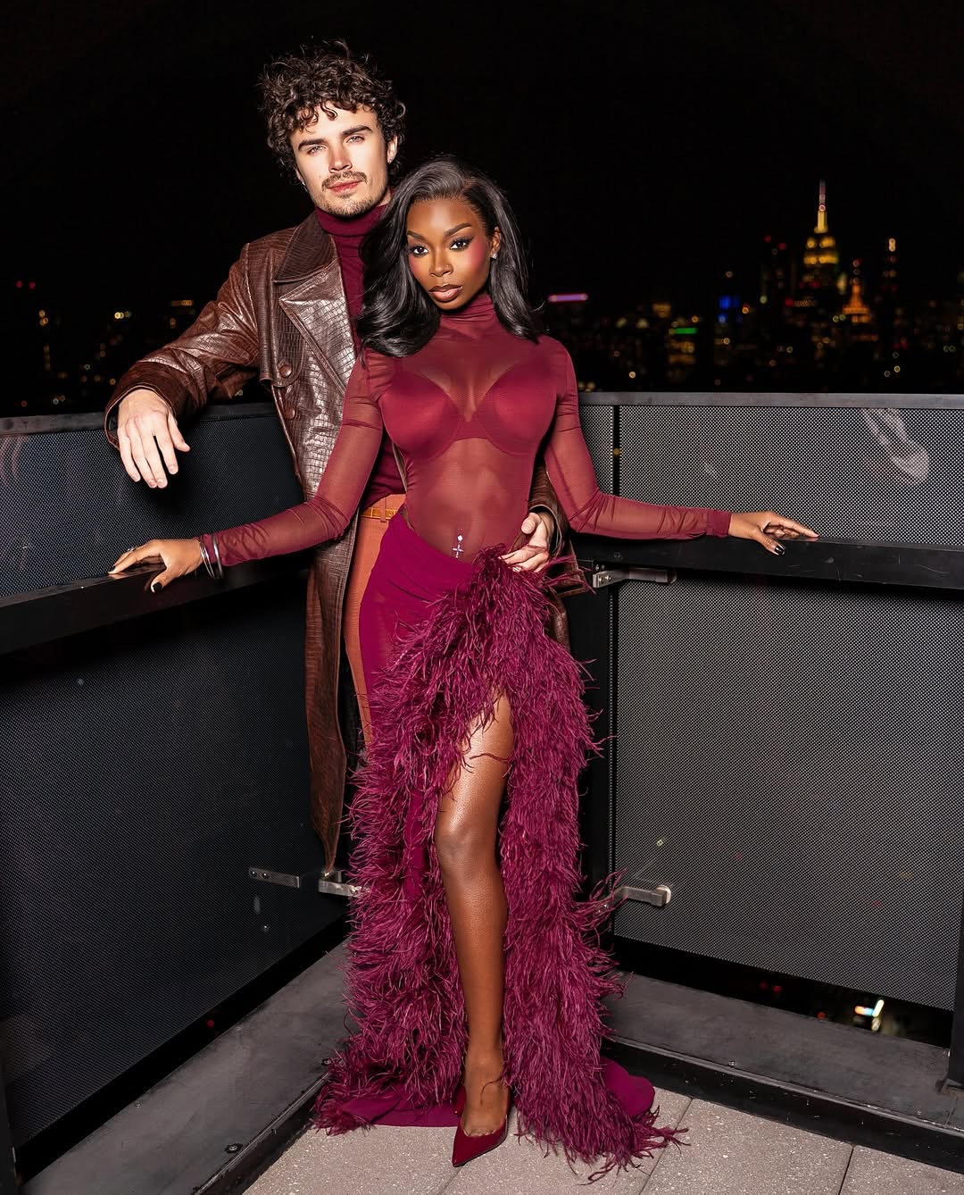 Olandria Carthen Coordinated With Beau Nicolas Vansteenberghe In A Maroon Bronx And Banco Look With Femme LA Heels 3