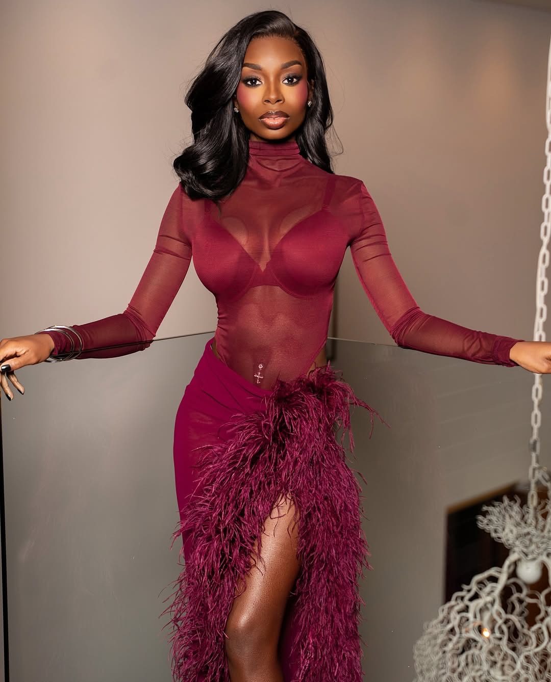 Olandria Carthen Coordinated With Beau Nicolas Vansteenberghe In A Maroon Bronx And Banco Look With Femme LA Heels 4