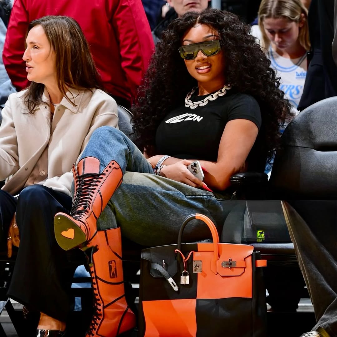 Megan Thee Stallion Courtside in Orange Lace-Up Heels and a Black