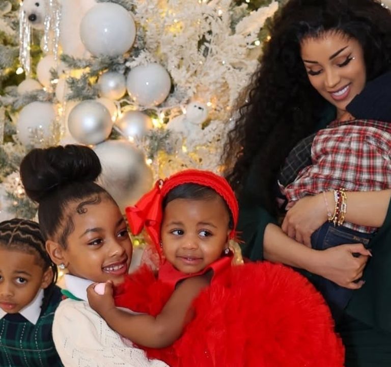 Cardi B Celebrates Christmas with Her Children in an Olive Green Bodycon Dress with Silver Metallic Heels