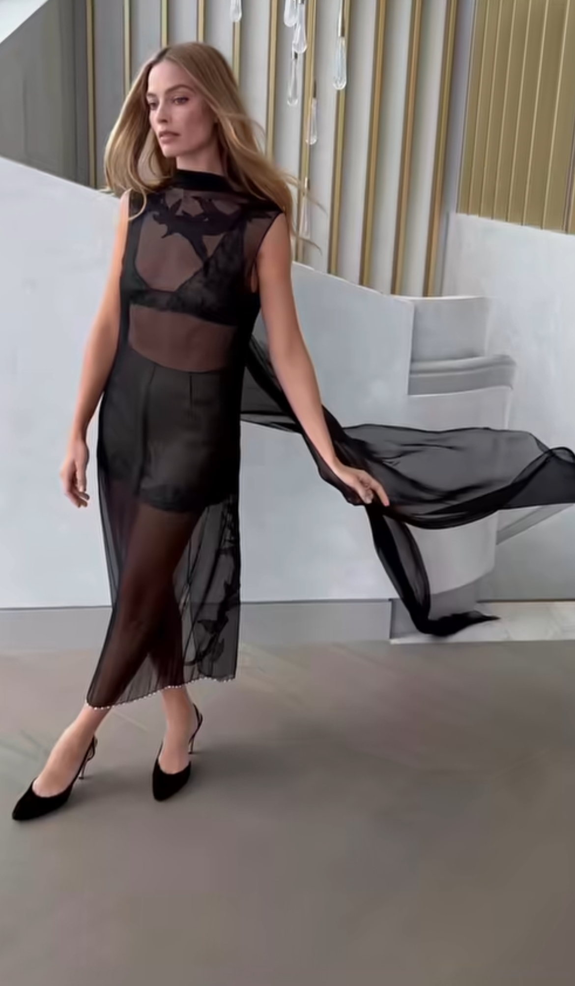 Margot Robbie Turns Up the Drama in Sheer Black Chanel Couture at a Press Event