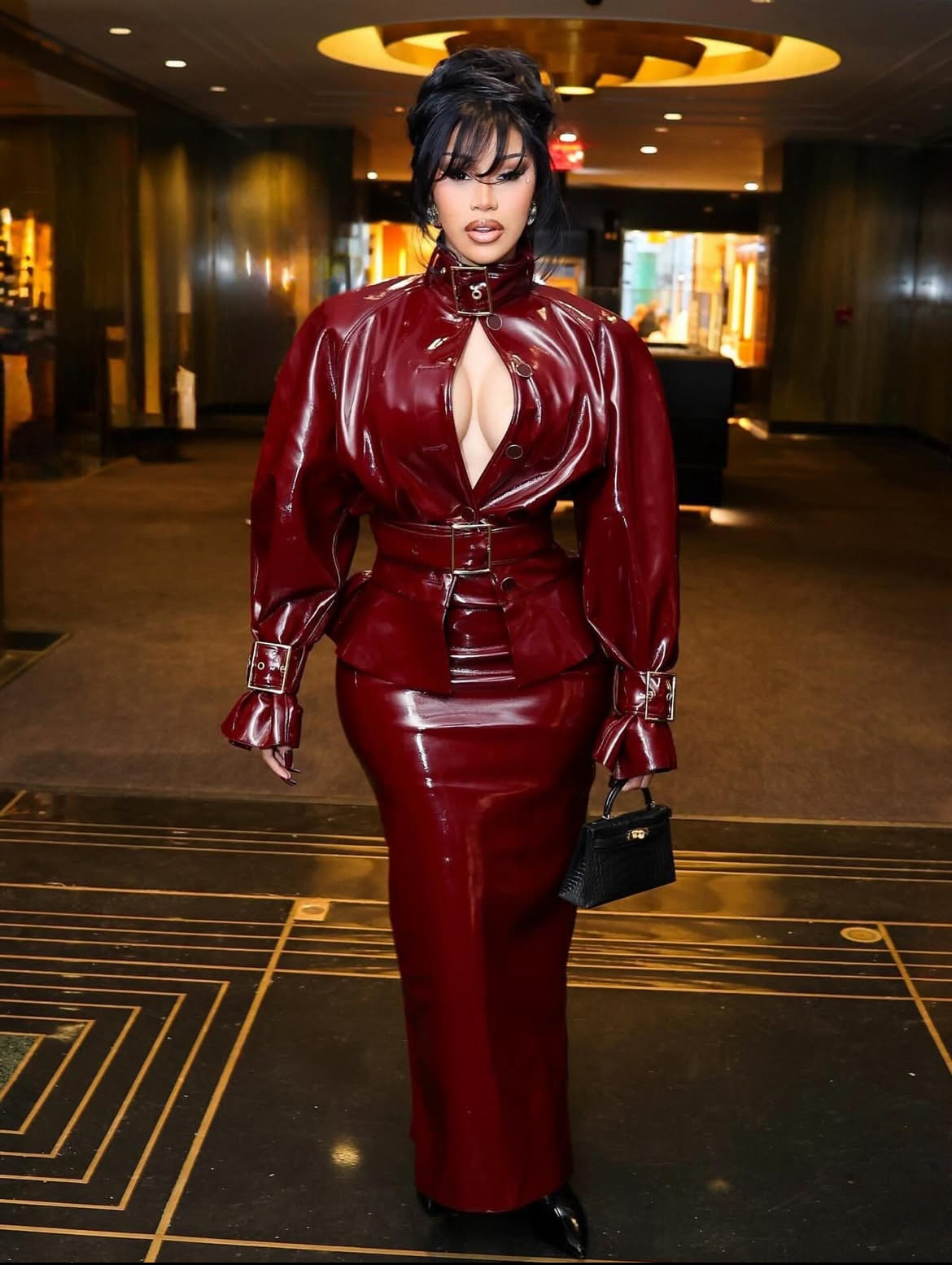 Top 5 Looks Of January Cardi B In A Burgundy Patent Rowen Rose Look Elton John In A Lime Green Set Teyana Taylor In Schiaparelli More 5